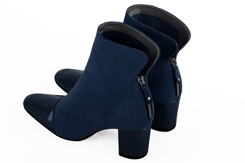 Navy blue women's ankle boots with a zip at the back. Square toe. Medium block heels. Rear view - Florence KOOIJMAN